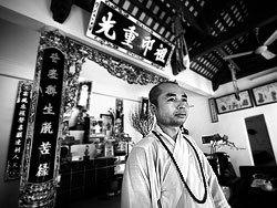 A monk in a Buddhist temple near Hanoi. He is living there for 14 years now.